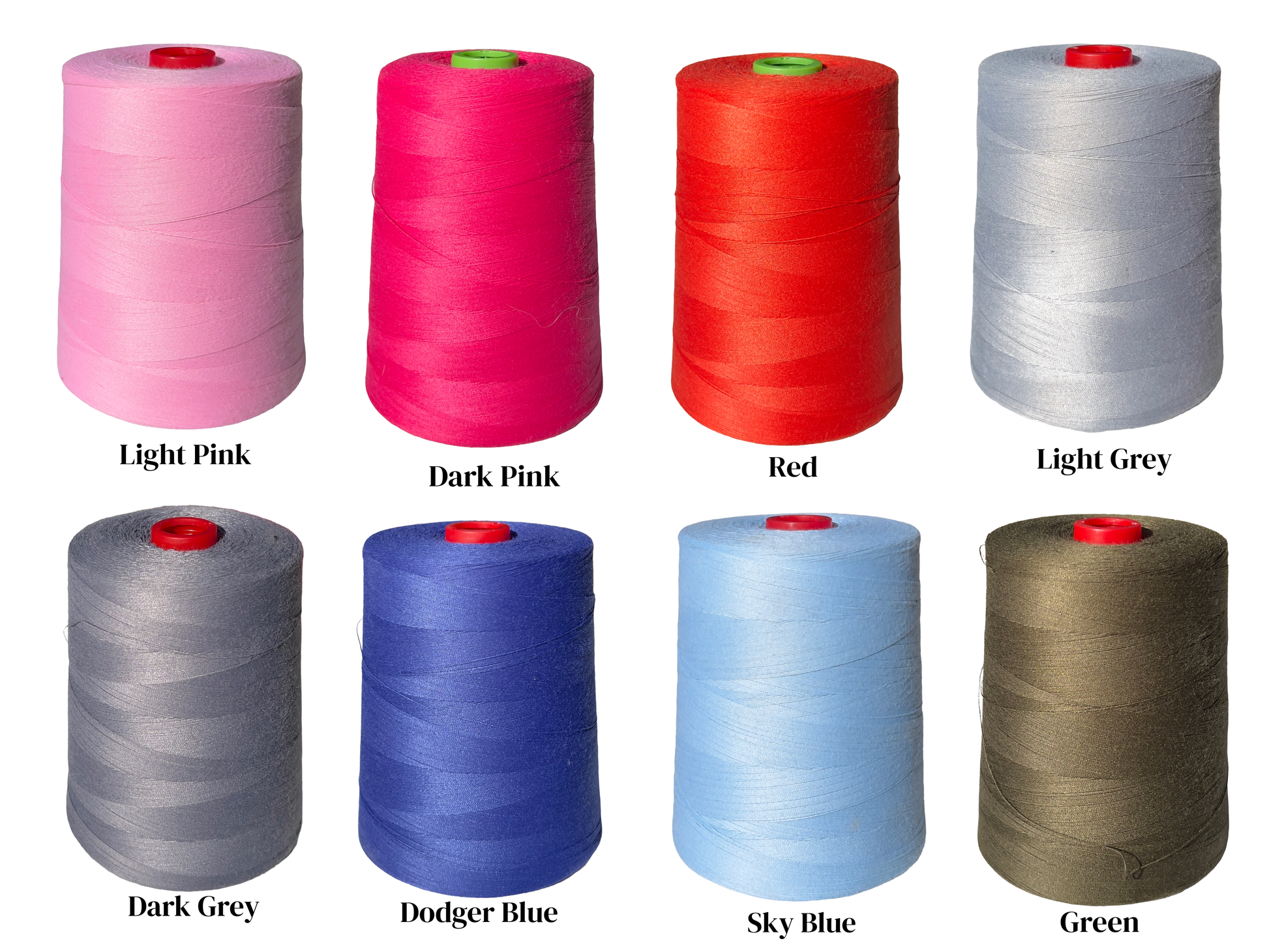 Set of spools of thread in various colors on a white background