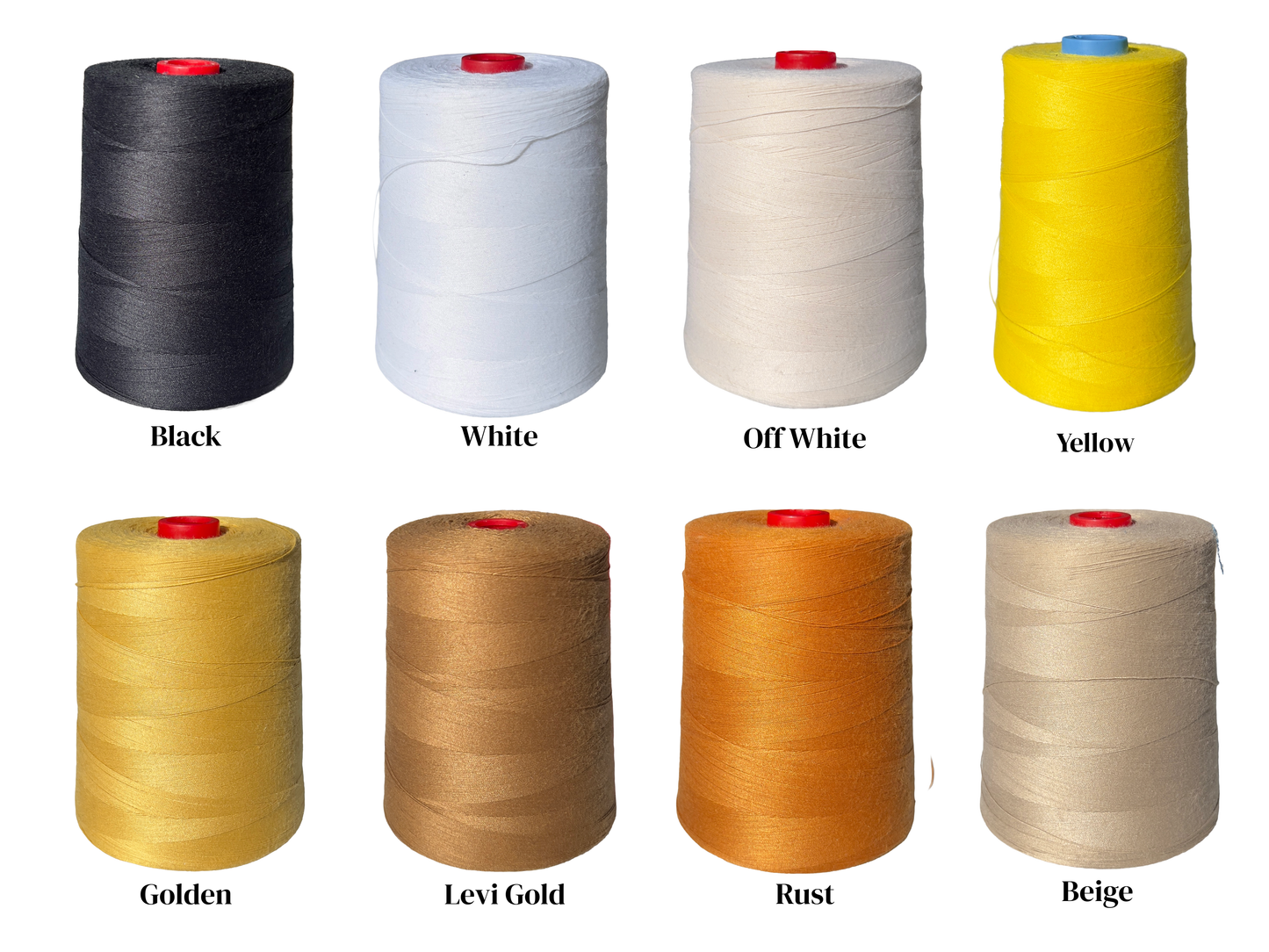 Collection of spools of thread in various colors on a white background